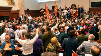 Politicians injured in fist fight as Macedonia parliament stormed