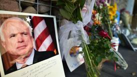 Trump bows to pressure and lowers flag to half-mast until John McCain funeral