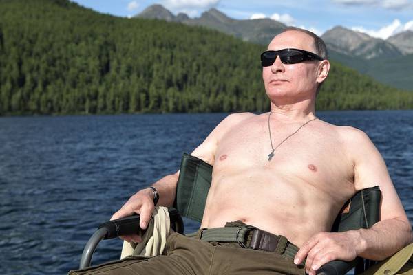 Siberian suntan: bare-chested Vladimir Putin goes fishing