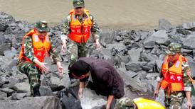 China landslide: more than 140 people feared buried