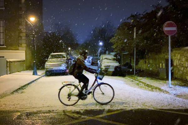 First snow showers land around country as bitter cold snap set to continue