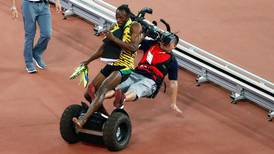 Cameraman on segway crashes into Usain Bolt after 200m win