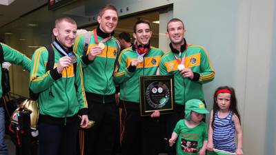 Conquering Irish boxing heroes welcomed at airport