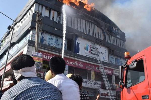 Two Indian fire officials suspended after coaching centre blaze kills 22