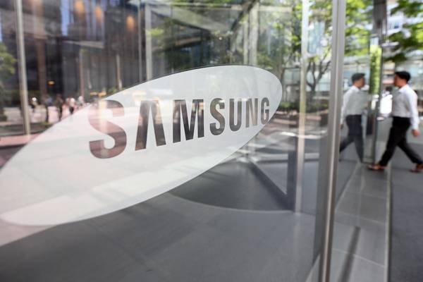 Samsung Electronics shares slide after reporting sharply lower profit