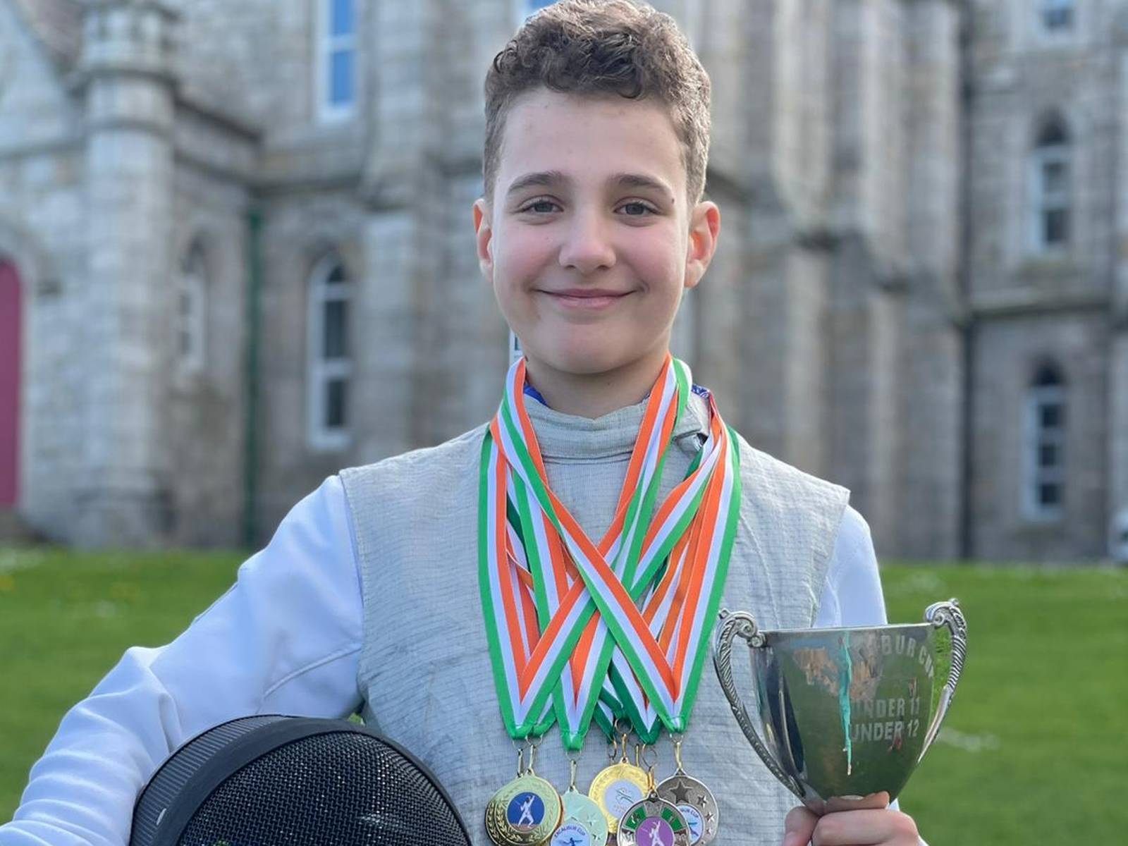 Daniel Karas (11) from Ukraine, with his Irish medals for fencing