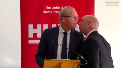 Man charged over Belfast security alert which interrupted Coveney speech