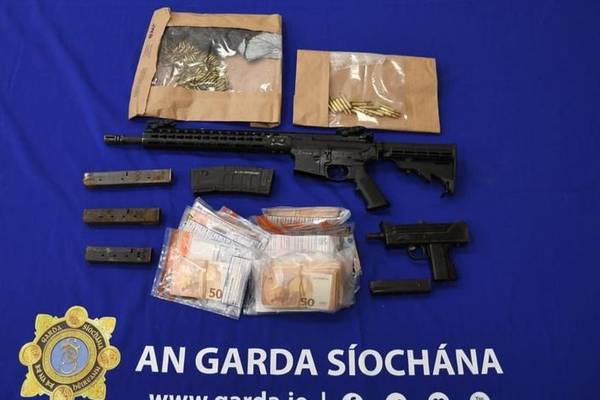 Gardaí seize guns and cash in raid on north Dublin gang
