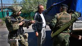 Ukraine rebels seize mediators as West readies sanctions