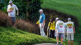 Peter Lawrie and Graeme McDowell off the pace in Malaysia
