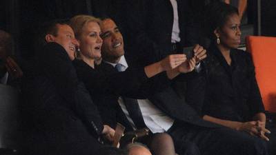 Obama, Cameron pose for ‘selfie’ at service