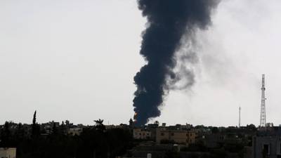 Rocket hits huge fuel tank near Tripoli airport as militias clash