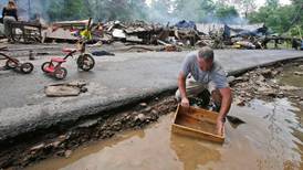 West Virginia floods kill at least 23 people