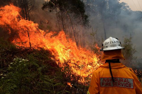 Bushfires burn across Australia with hotter weather expected