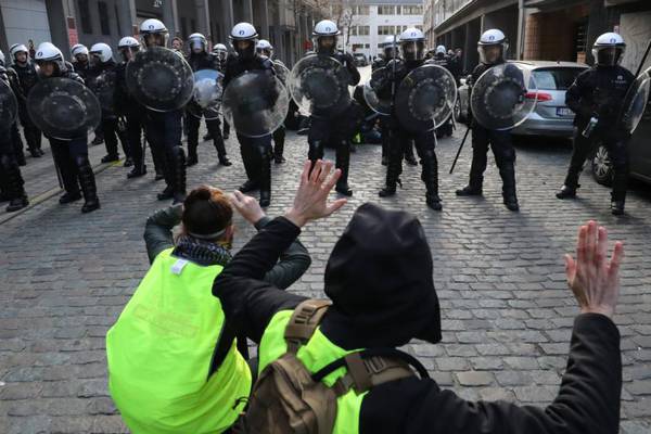 Belgian police use water cannons and tear gas against ‘yellow vest’ protesters