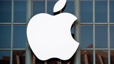 Apple shares fall on Qualcomm injunctions in China