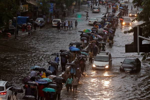 At least 14 dead as Mumbai hit by flooding
