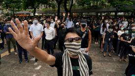 Hong Kong leader bans protesters from wearing masks