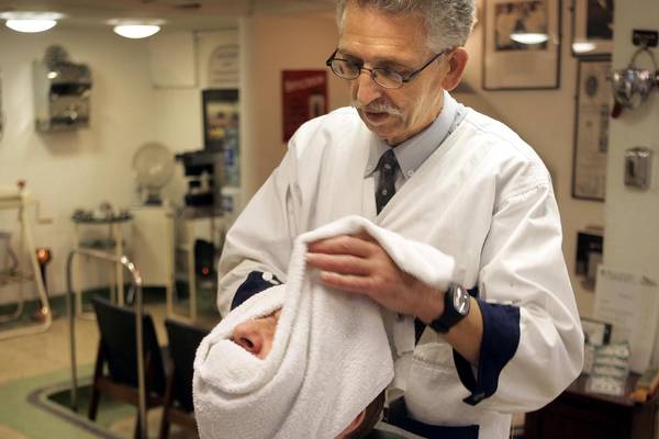 Old-school Dublin barber with online following dies aged 73