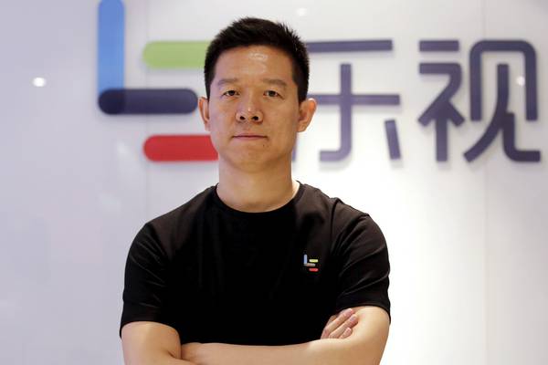 Chinese tech tycoon sticks to electric cars as he quits troubled LeEco