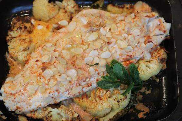 Baked hake, cauliflower, almond, harissa and orange dressing