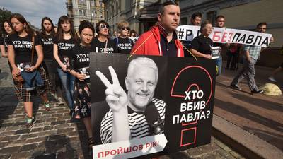 EU and rights groups urge Ukraine to find top journalist’s killers