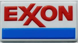 Exxon’s output rises but   weakness  in refining  hits profit