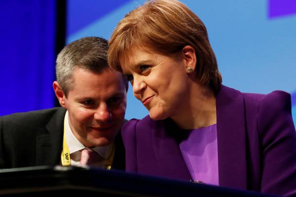 Scottish finance minister resigns over unsolicited messages to boy