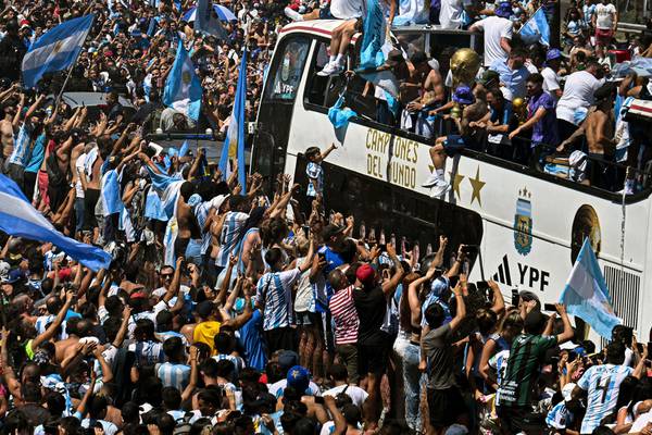 Argentina forced to swap bus for helicopters as fans swarm streets during parade