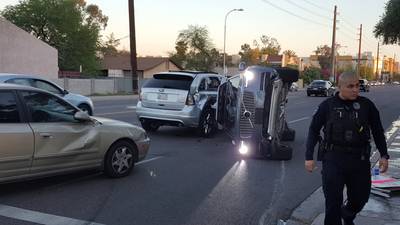 Uber suspends tests on self-driving cars after crash in Arizona