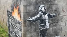 Banksy artwork painted on side of garage sold for six-figure sum