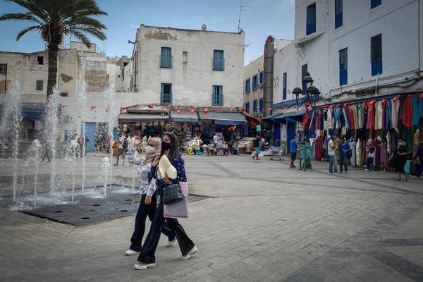 Tunisians watch and wait after president carries out a power grab