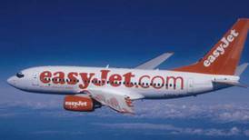 Easyjet shrinks losses as it lures business passengers