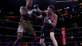 Andy Lee survives early knockdowns to draw with Quillin