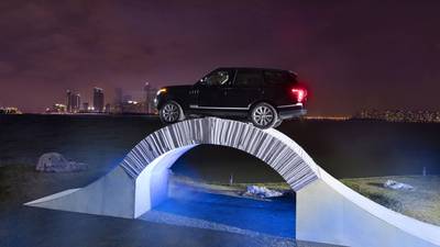 Range Rover drives over paper bridge to mark its  birthday