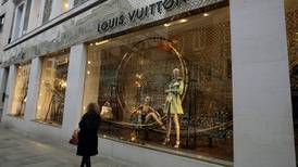 Dresses and monogram bags boost Louis Vuitton sales