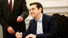 Tie-less Tsipras chooses civil swearing-in as Greece's new prime minister