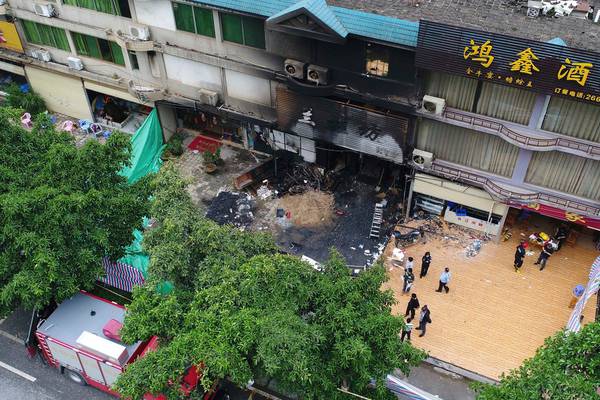Eighteen dead after fire at Chinese karaoke bar