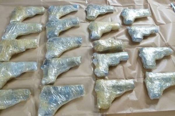 Dublin man remanded in custody after 60 guns found in car at Kent port