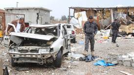 At least 16 killed as bombers target Iraq security forces