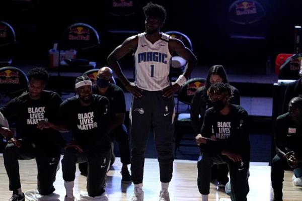 Jonathan Isaac is first player not to kneel since NBA’s return