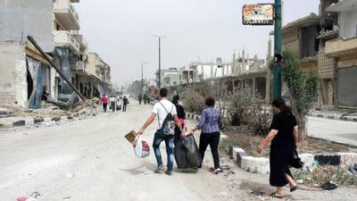 Strategic Syrian town of Qusayr reduced  to rubble