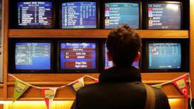 Bookmaker William Hill’s first-half profit falls