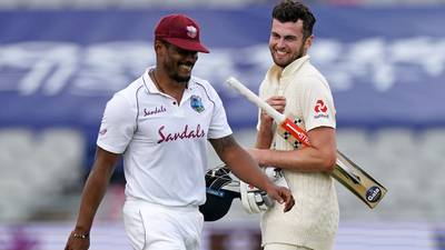 Sibley and Stokes steady the England ship after Archer goes overboard