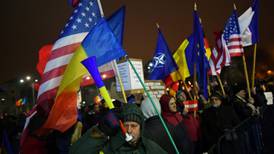 Romania’s  government holds on and calls for an end to protests