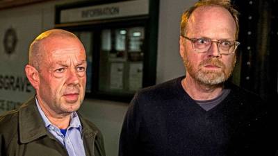 Why were two journalists investigating Loughinisland arrested?
