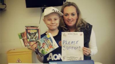 Boy who beat cancer raises €24,000 for hospital  consoles