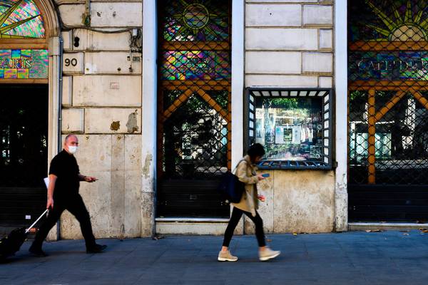 Italian bond sale raises most on record