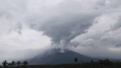 Indonesia volcano continues to spew ash as death toll rises to 22