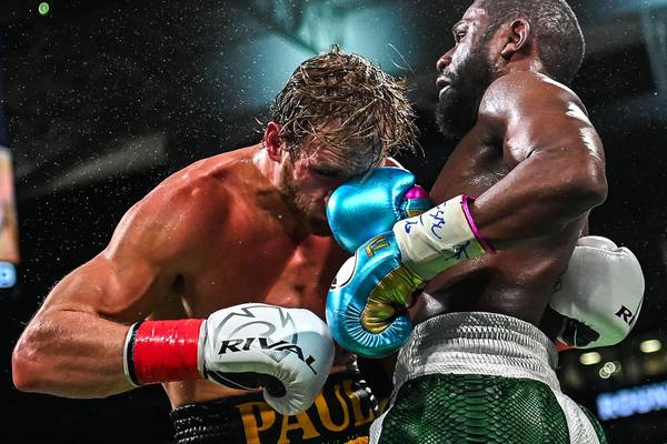 Logan Paul v Floyd Mayweather fight ends in boos as each fighter makes millions